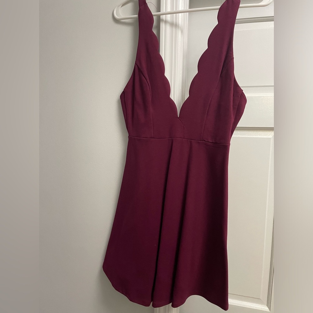 Red plunging neck line mini dress